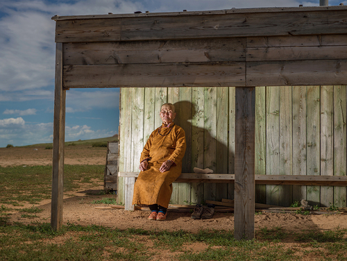 Old Mongolian Lady at Sunset