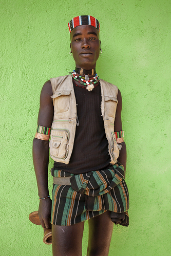 Omo Valley Tribesman Against Green Wall, Ethiopia