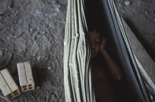 Young brickmaker resting