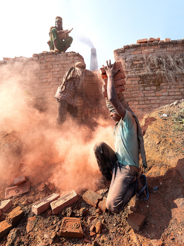 Boy in a brick factory