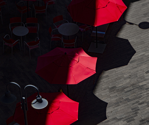 Three Red Umbrellas