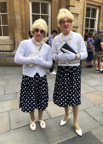Two Gentleman Hoping To Cheer the Crowds