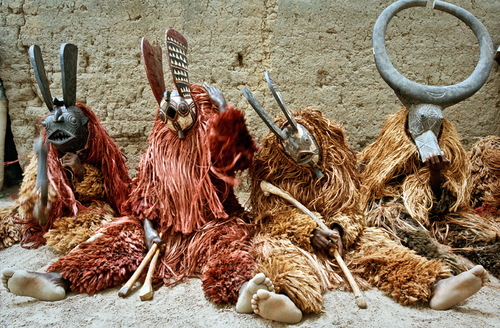 Exhausted Mask dancers