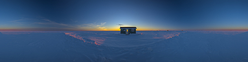 Ice Fishing House at Sunset