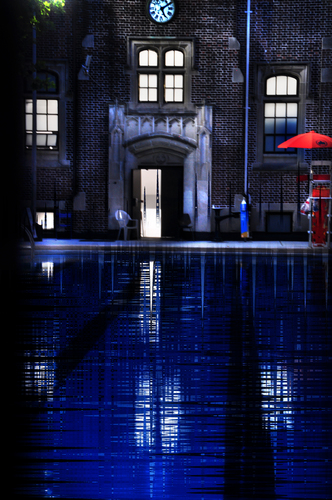 Blue pool red umbrella     john jay