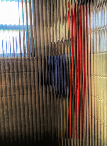 Towels Behind a Shower Glass