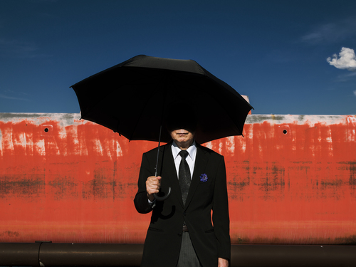 Old man with an umbrella