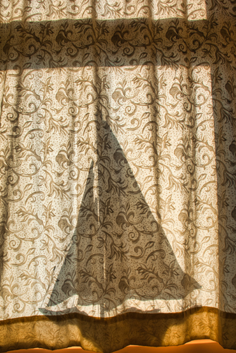 Behind the Curtain