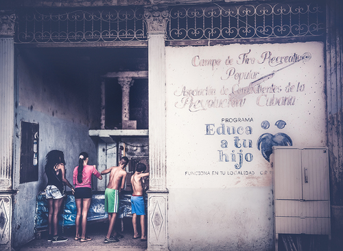 Children Learning to Shoot Guns in Cuba
