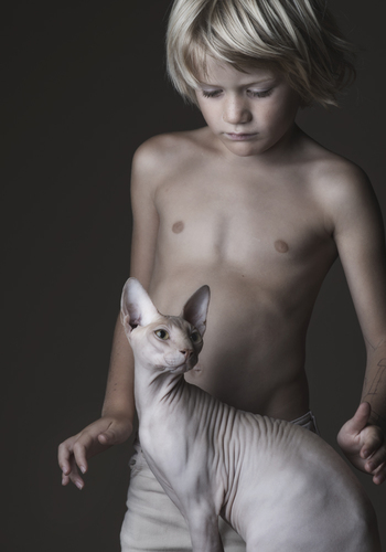 Portrait of a Young Boy and his Cat