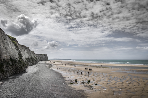 Figures on a beach