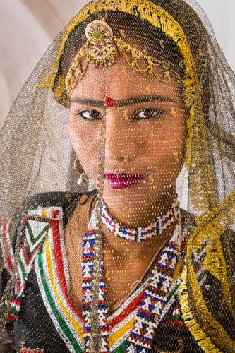 Behind the Veil