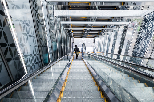 Glass-encased escalator