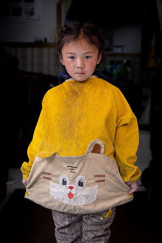 Girl in the yellow jumper