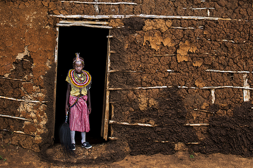 Girl on Threshold of Church