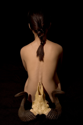 A WOMAN AND A SKULL