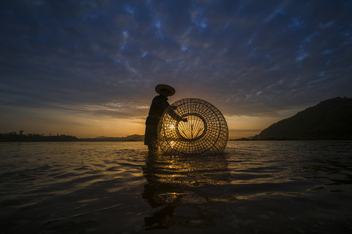 Man, Net and Sea