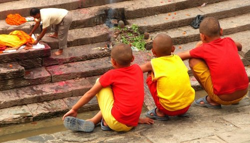 Young Boys Watching Cremation Ceremony at Kathmandu