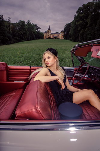 In her Cadillac