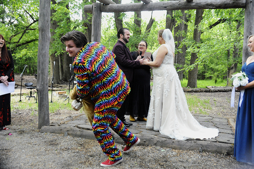 Flower Dude prevents Ring Bear-er from disrupting ceremony