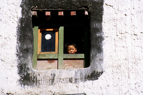 Window Watcher. Tibetan Kingdom of Mustang, Nepal