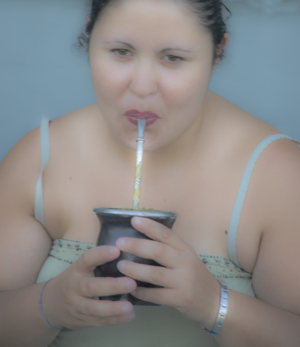 Woman Drinking Mate