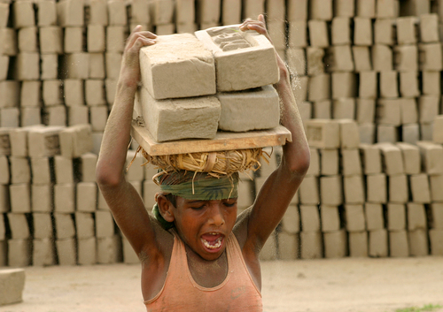 boy carrying bricks, Bangladesh