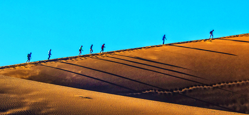 Climbing the dune at sunrise Climbing the dune at sunrise