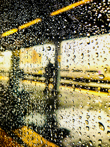Raindrops falling at train station