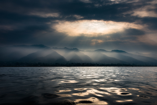 Dawn dusting over the hills at dawn - Inle Lake, Myanmar