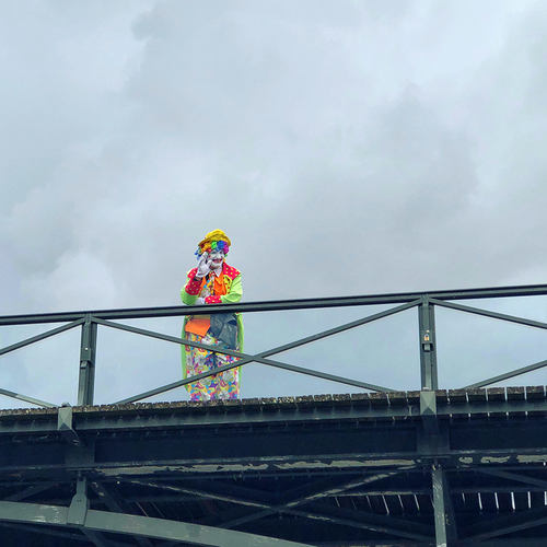 Clown on a bridge