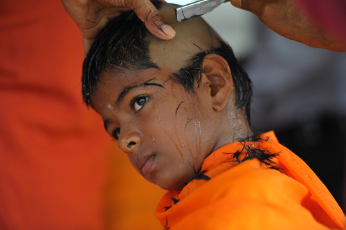 Haircutting Ritual for Traditional Festival in Malaysia Haircutting Ritual for Traditional Festival in Malaysia
