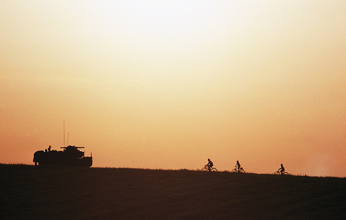 Live US military maneuvers and local kids biking, Germany Live US military maneuvers and local kids biking, Germany