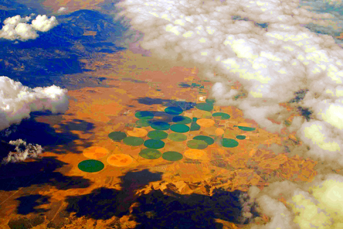 Cloud Shadows/Irrigation Circles ROCKY MTNS