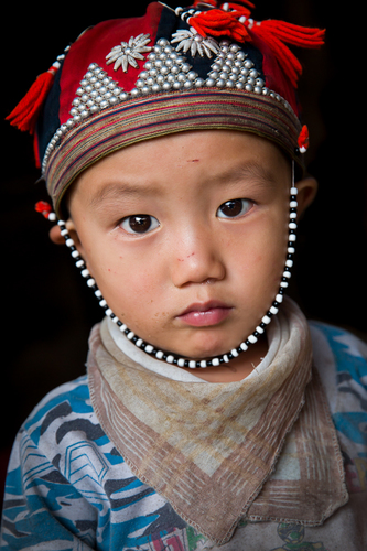 Vietnamese Boy with Traditional Hat