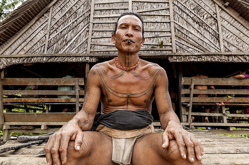 Mentawai Man In Front Of House, Indonesia
